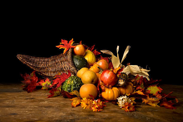 a bowl of fruit sitting on a table